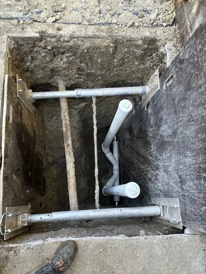 Experienced plumber completing Drain Cleaning work in Medford
